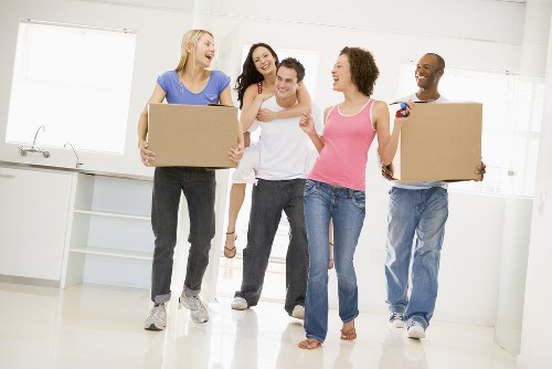 Professional movers preparing a transparent removal quote