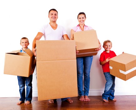 Commercial moving team handling office equipment in Bow