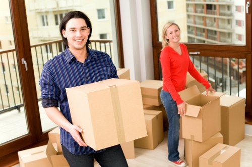 Professional office movers handling equipment and furniture in Bow
